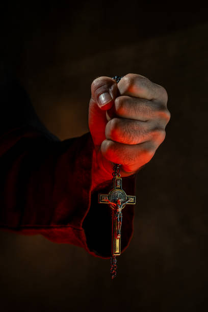 Monk holding a crucifix