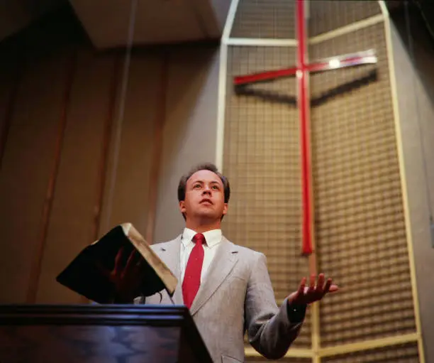 A protestant preacher preaching