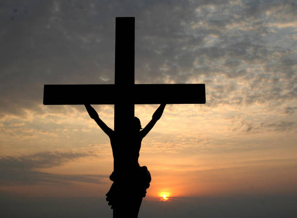 A silhouette of a depiction of the crucifixion of Jesus Christ to highlight how the gospel highlight Jesus Christ